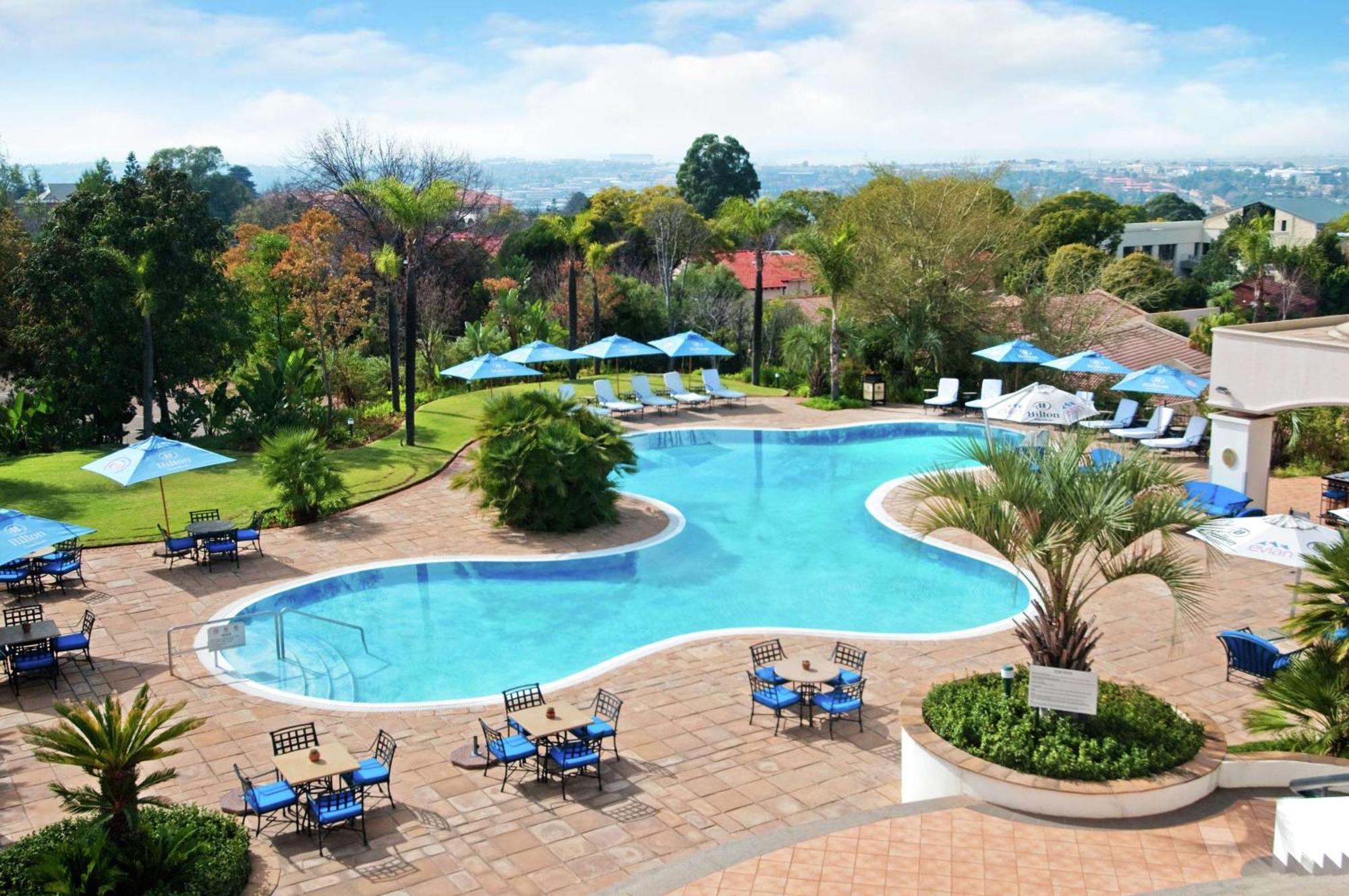 Nh Johannesburg Sandton Hotel Exterior photo The pool at the Hilton Johannesburg