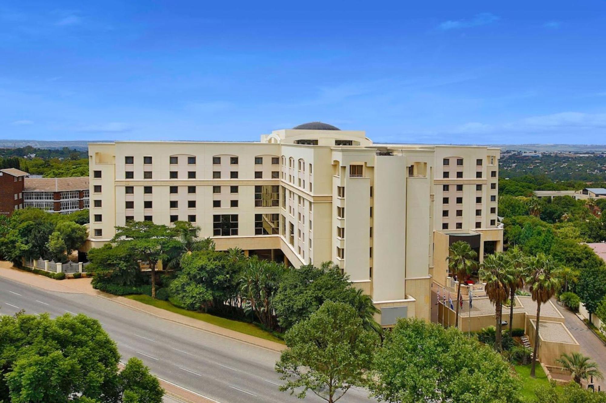 Nh Johannesburg Sandton Hotel Exterior photo The University of Texas at San Antonio's Brooks Hall